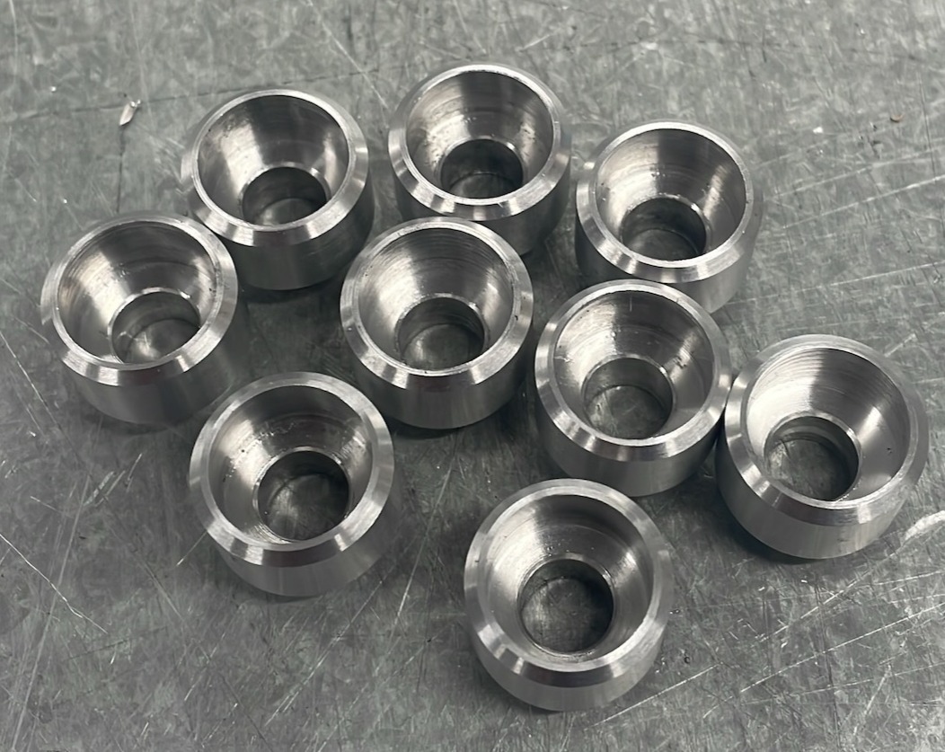 Machined anti intrusion plate spacers